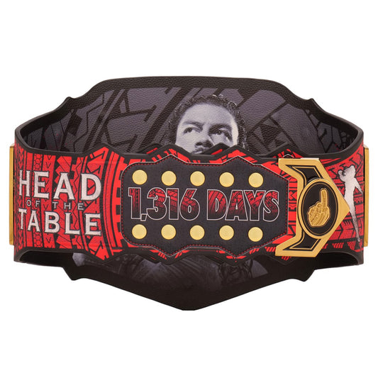 Undisputed WWE Championship belt with black and red design, gold trim, jeweled WWE logo, and black strap