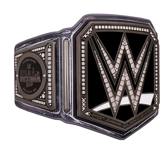 WWE WrestleMania Golden Championship replica belt featuring a black center plate, silver-tone WWE logo, sparkling crystal accents, and detailed metallic borders, perfect for wrestling fans and championship belt collectors.